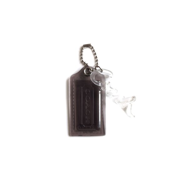 Coach Accessories - Coach Large Hangtag Smoke Acrylic Tag with Script Coach Logo in Clear Acrylic